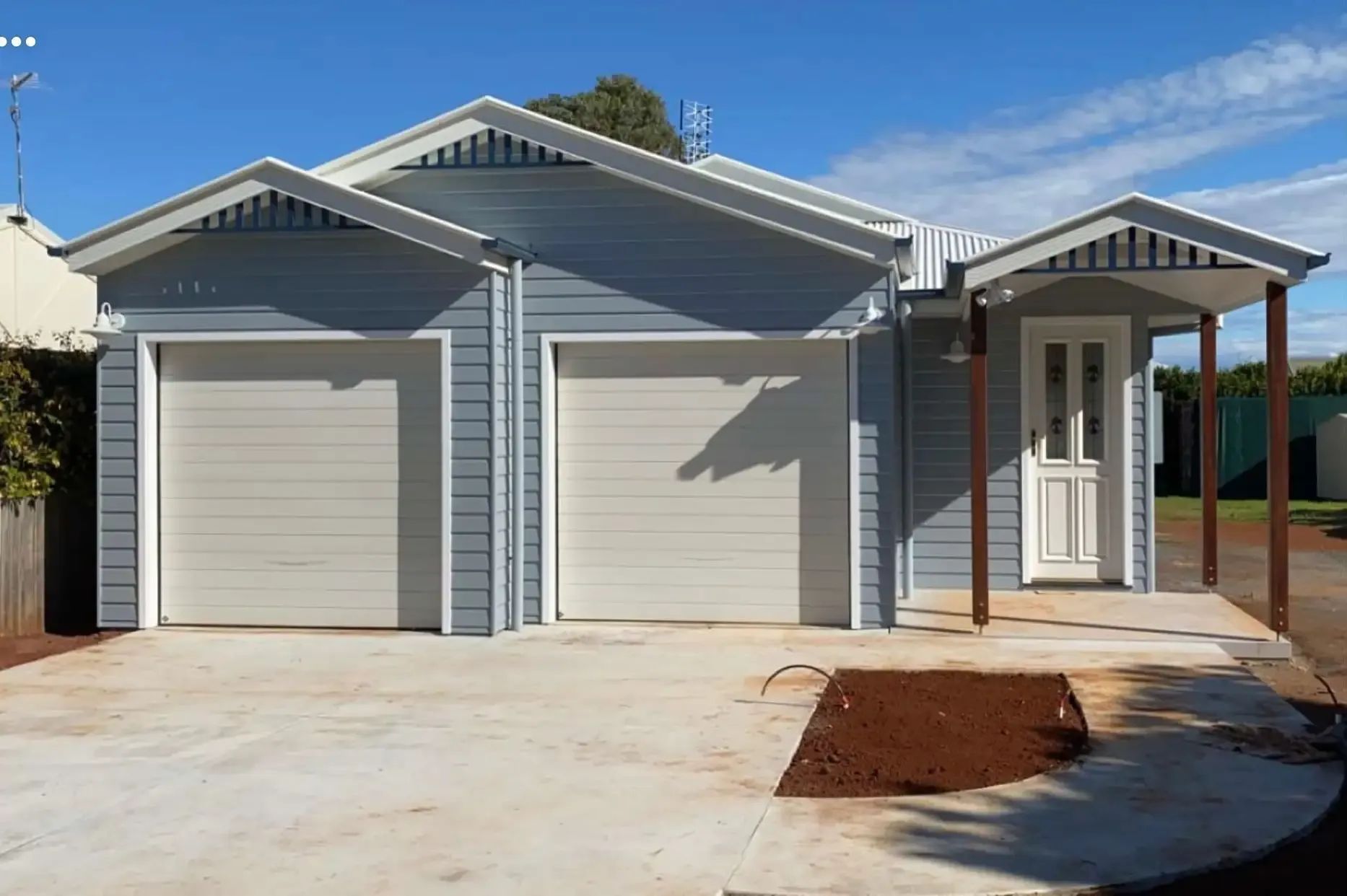 Blue Garage with Two Doors and A Small Covered Entryway — C & S Building Pty Ltd In Casino, NSW