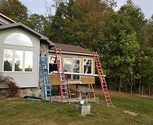 Install Glass — House Under Installation of New Windows in Byron Center, MI