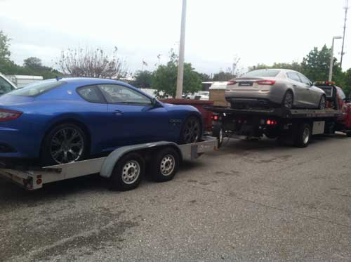 Towing a blue car - Roadside assistance in Sarasota, FL