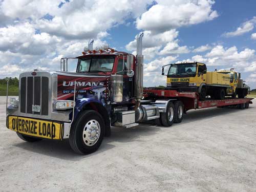 Towing a yellow truck - Tow trucks in Sarasota, FL