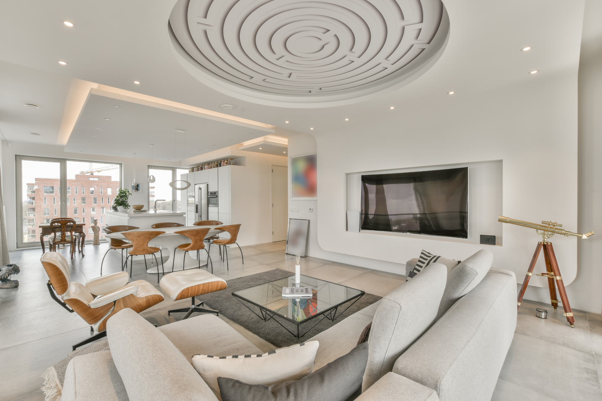 A living room filled with furniture and a flat screen tv beautiful custom lighting. 