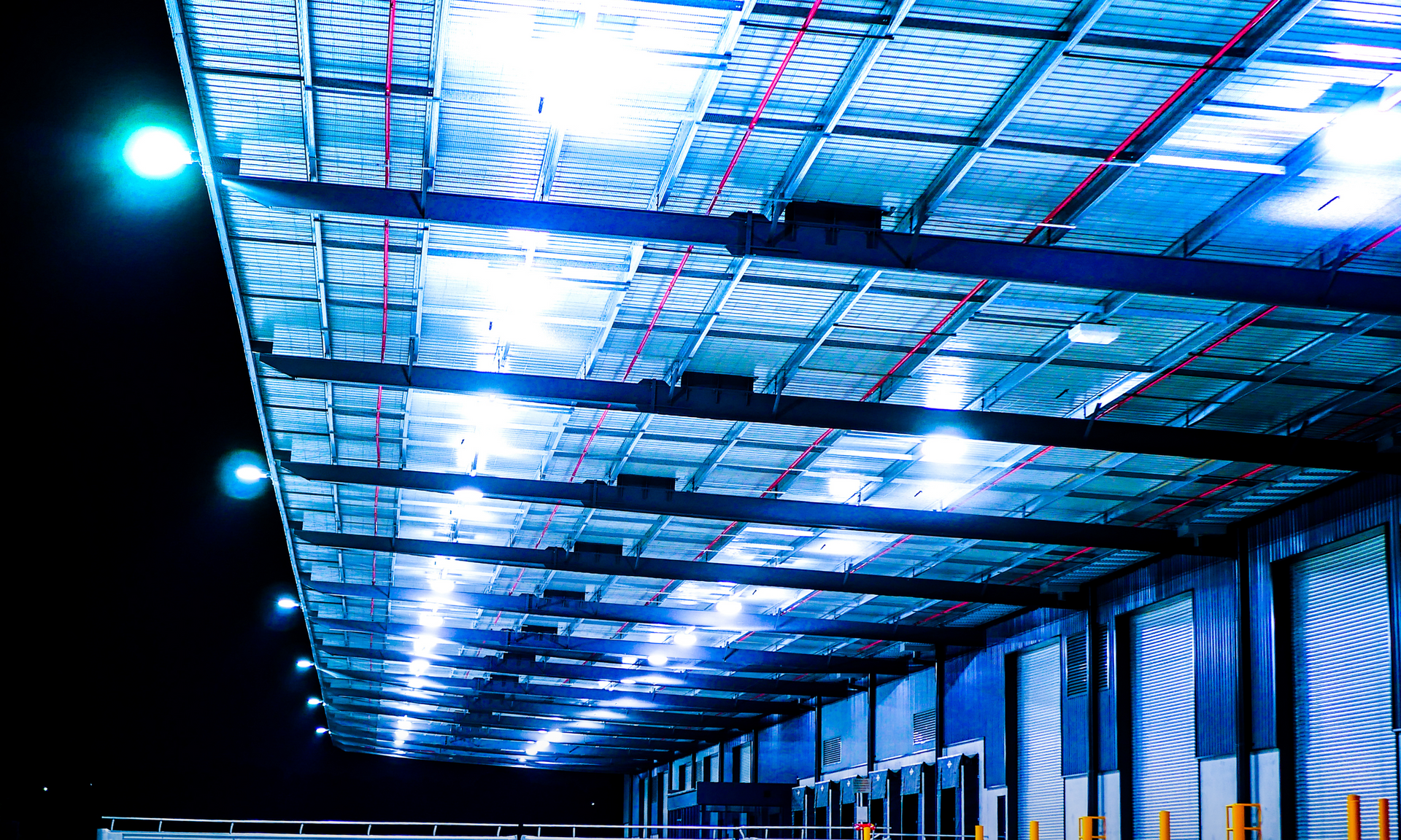 A large building with a lot of lights on it at night, project completed by Aarons lighting & Design. 