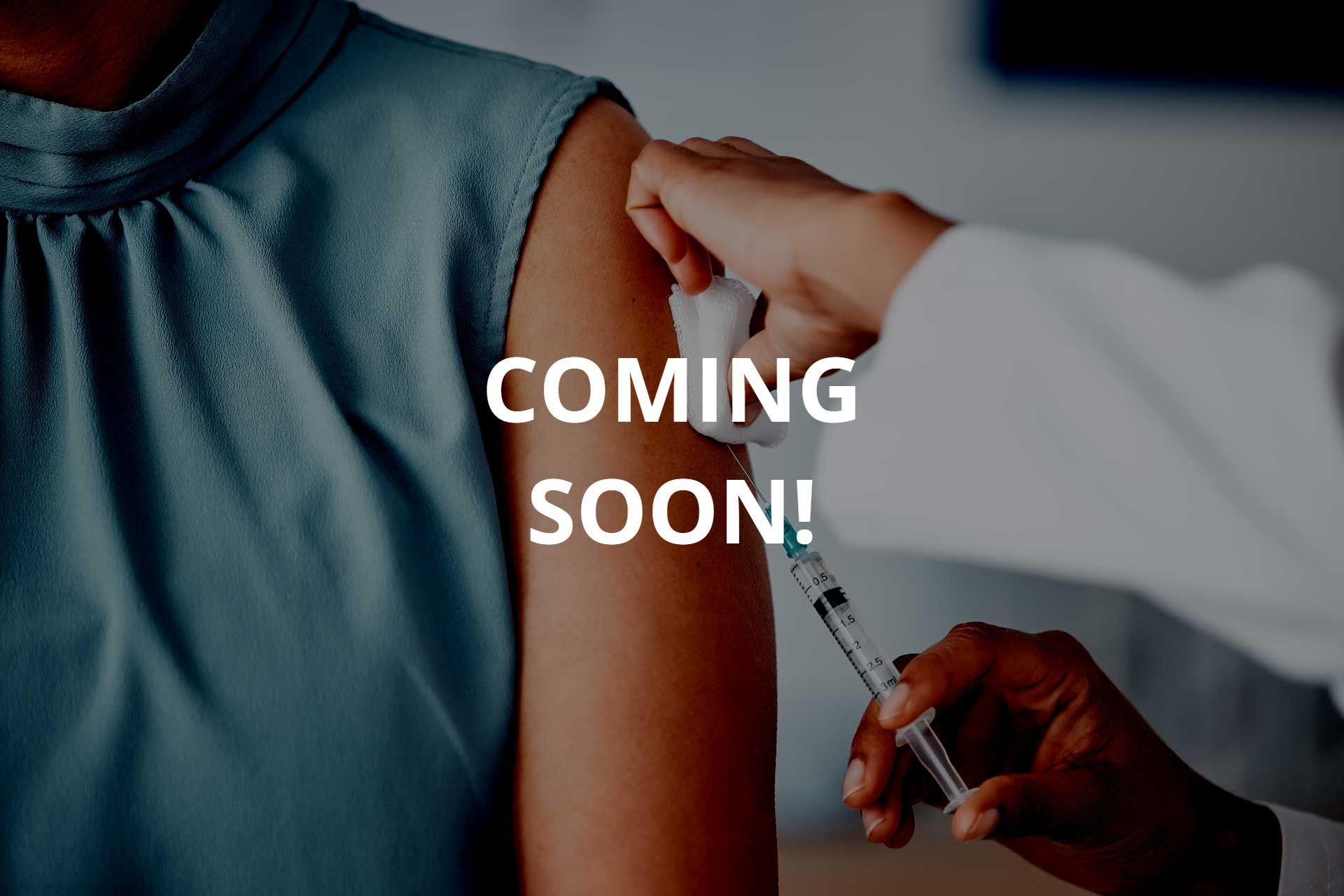 A woman is getting an injection in her arm.