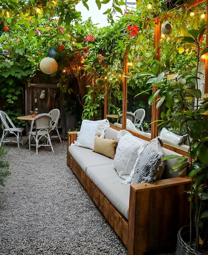 A Patio With A Couch, Chairs, Tables And Plants — Alex's Vegetation in Port Macquarie, NSW