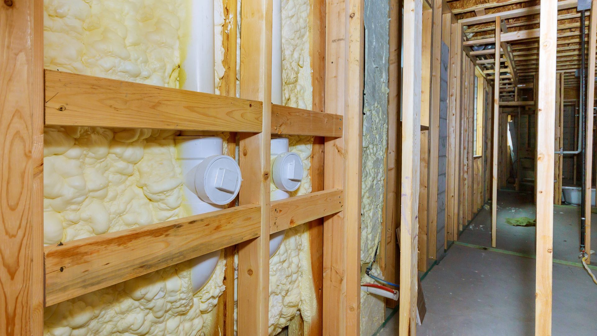 a spray foam insulation installation in a commercial space to prevent fire in Spresser