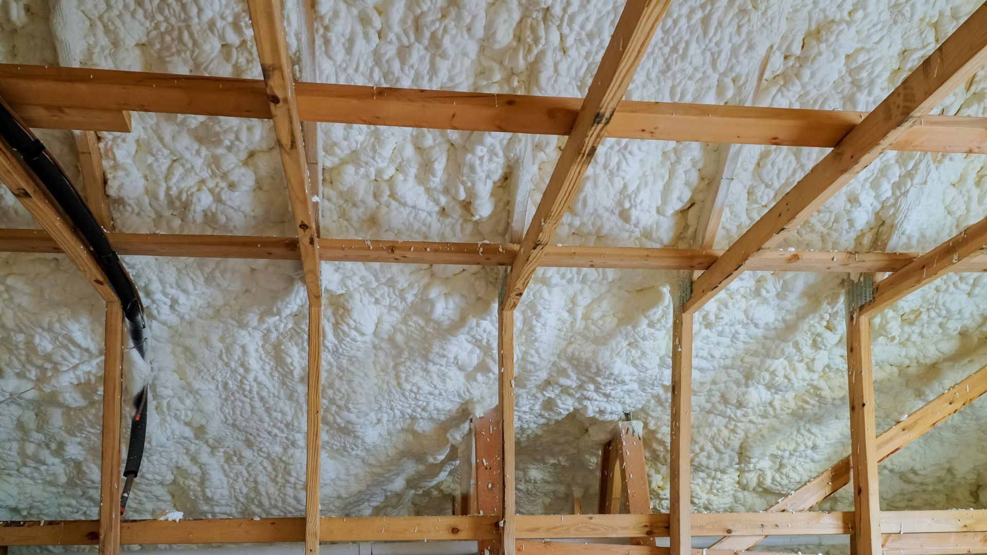 Spray foam insulation installation performed in a residential home in Spresser