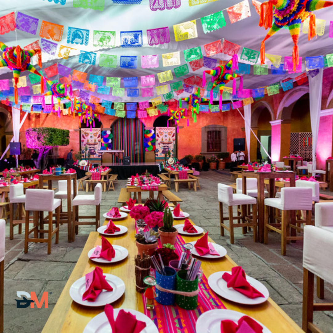 A large room filled with tables and chairs with plates and napkins on them
