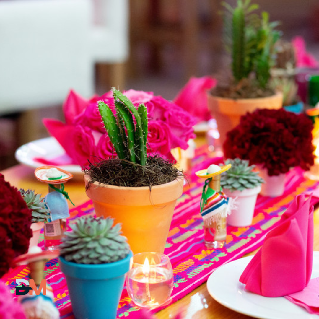 A table with flowers and candles on it