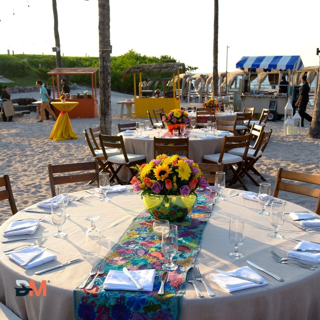 A table with a vase of flowers on it