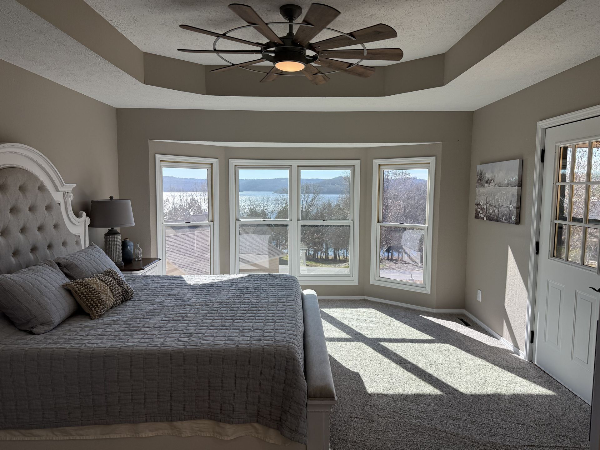 A living room with a fireplace and a flat screen tv
