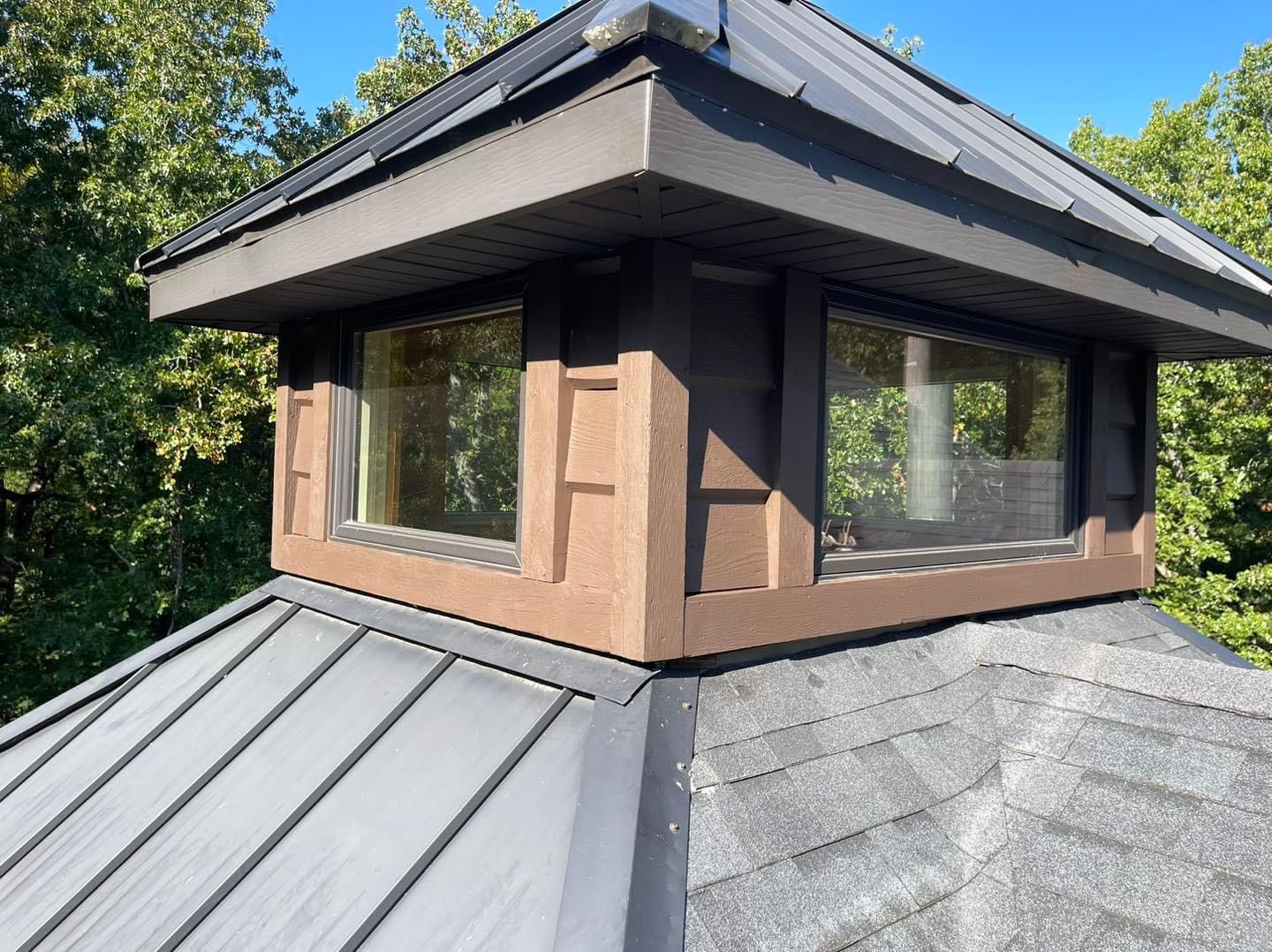A roof with a chimney on top of it
