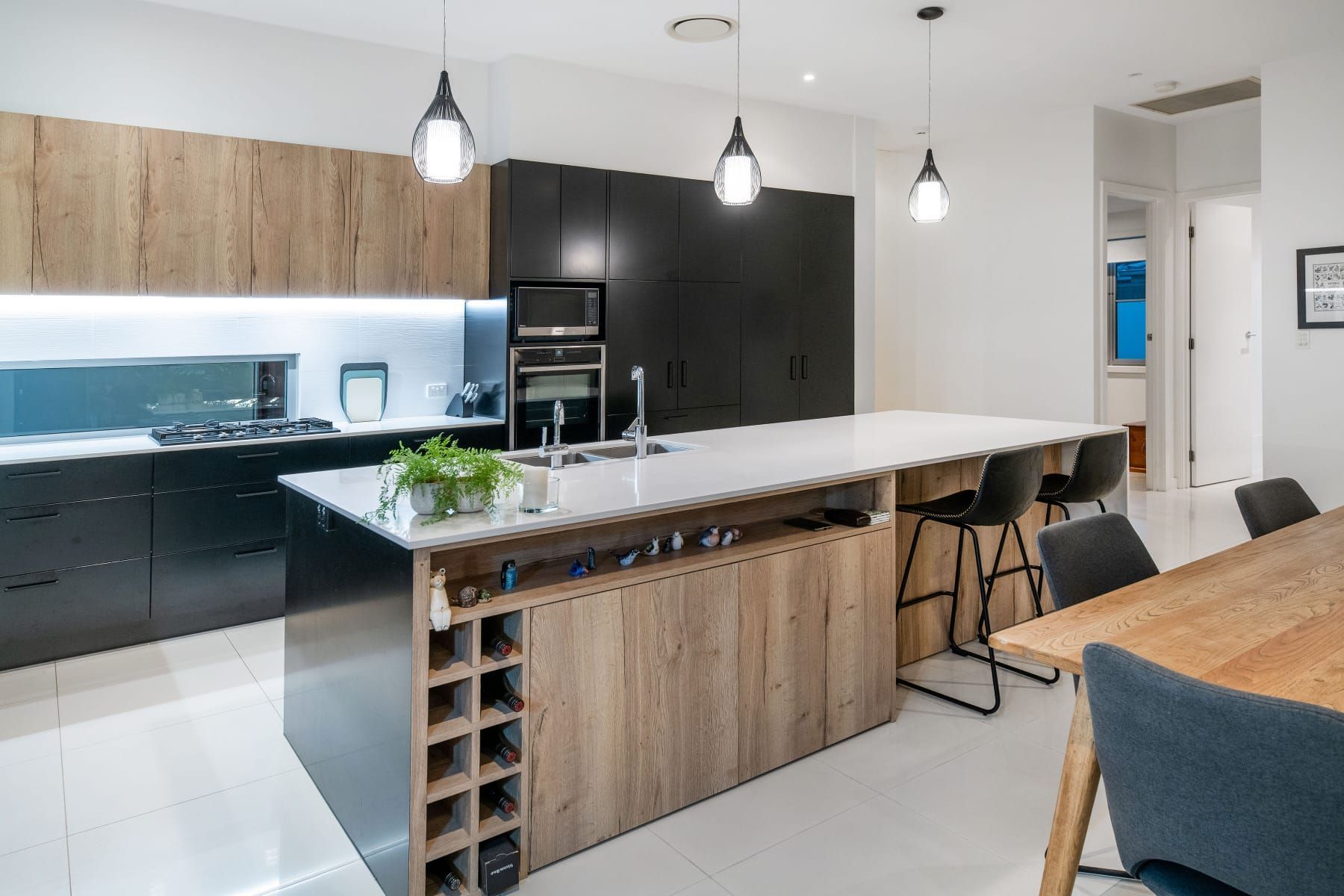 There Is a Large Island in The Middle of The Kitchen — B2B Electrical and Solar In Currimundi, QLD
