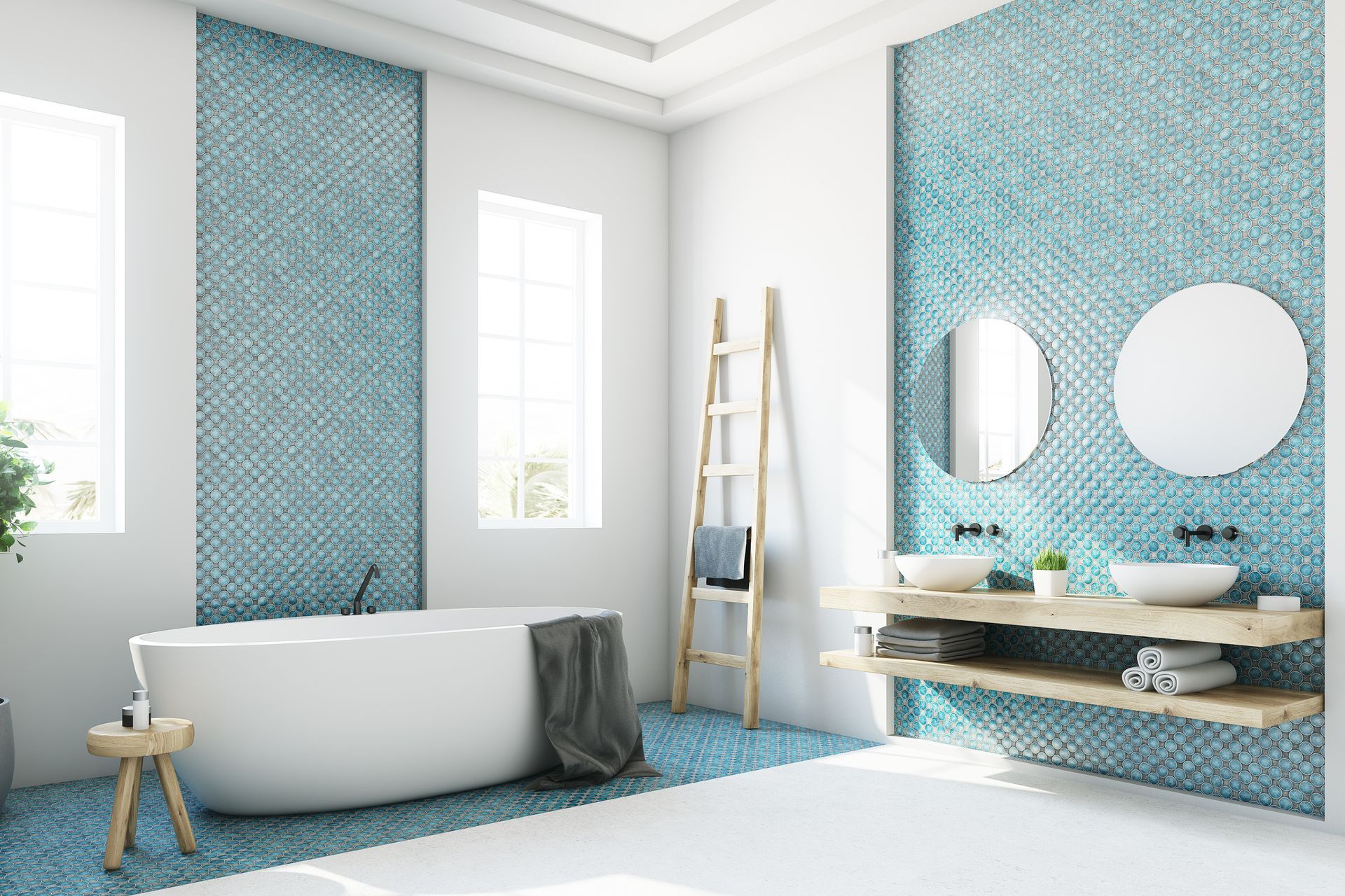 A modern, blue and white bathroom with wall tiles and a bathtub.