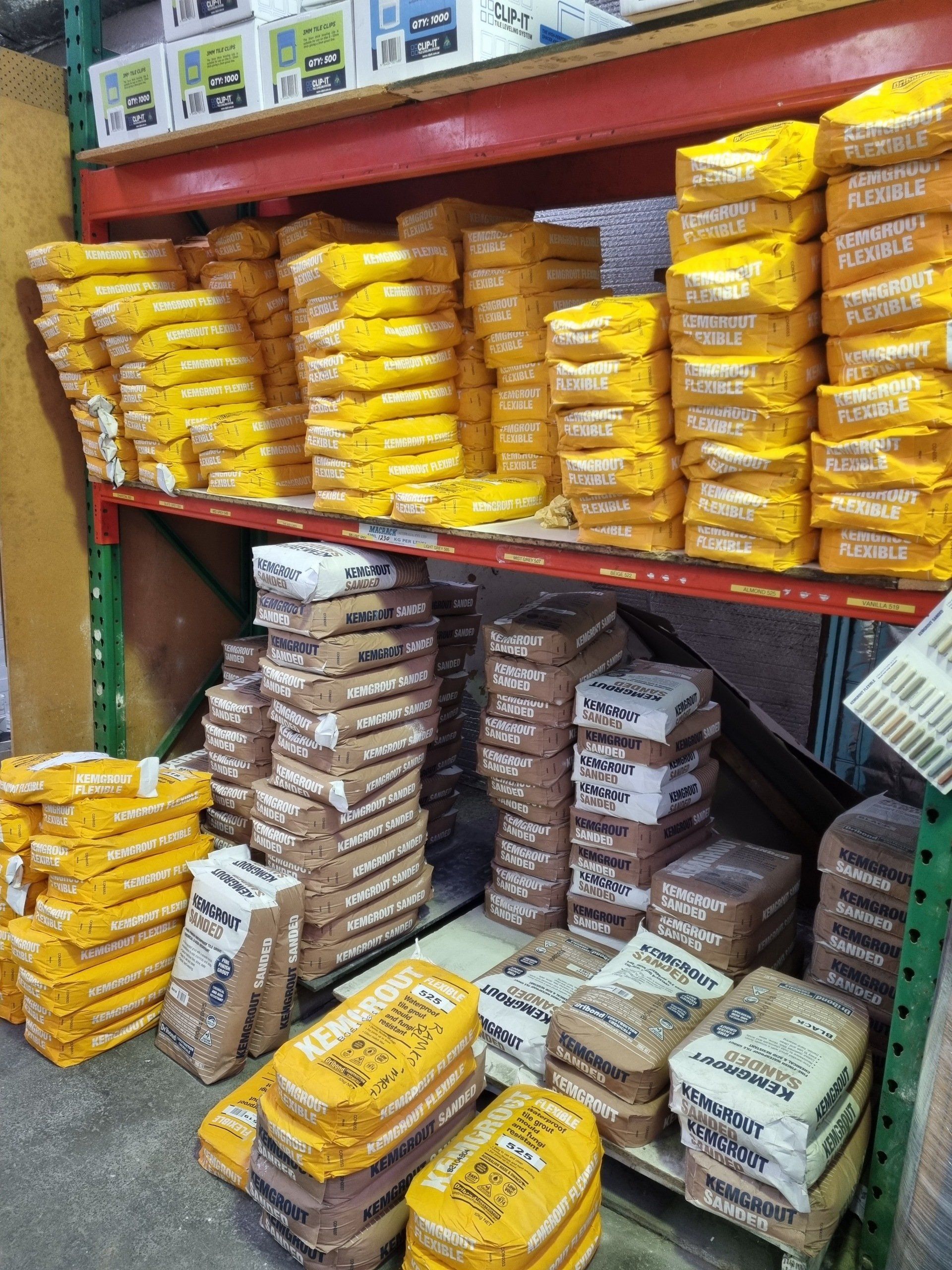 A warehouse filled with lots of bags of grout