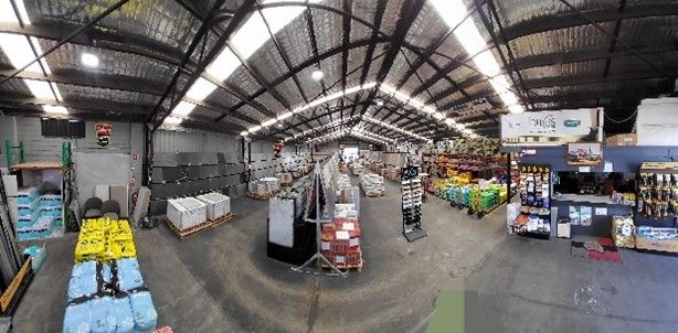 Shed filled with various types of tiles and a variety of products
