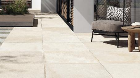 Close-up picture of an outdoor living area decorated with premium tiles.