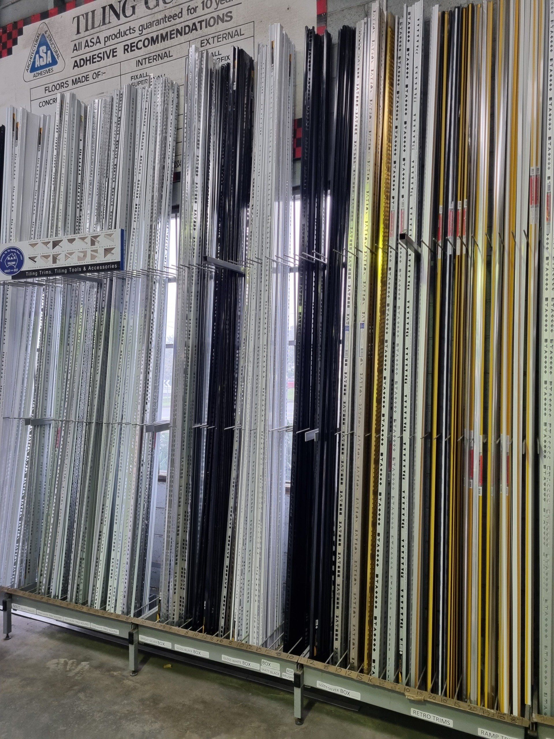 A shelf filled with lots of different types of trade supplies.