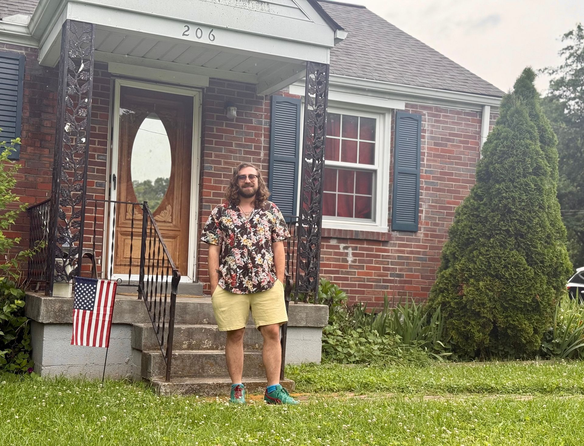 Real estate client celebrating a home purchase.