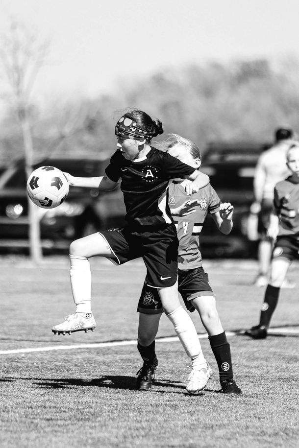 Youth soccer player in a game for Advantage Academy