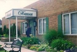 A close up of a bunch of flowers with a dark background.