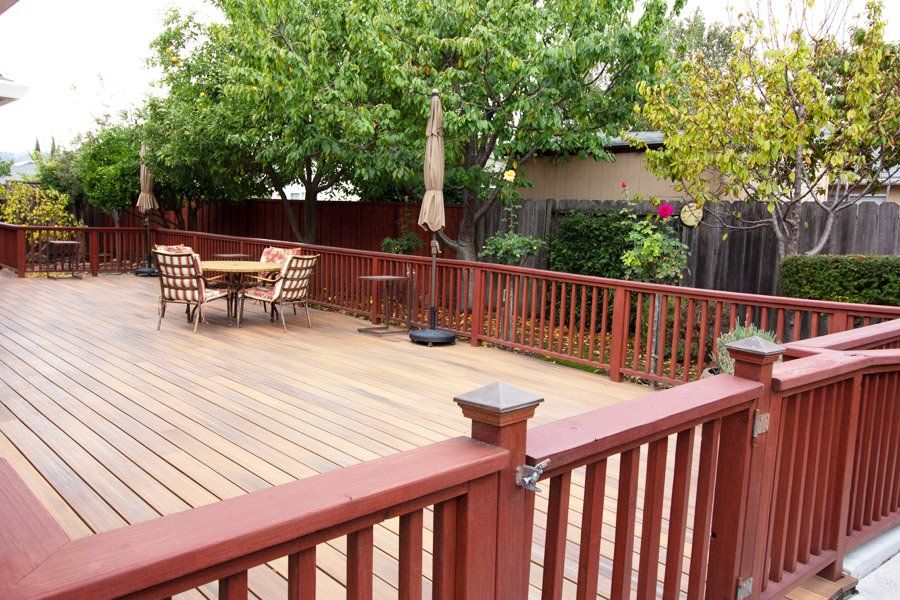 patio with table and umbrella
