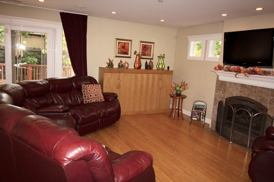 living room with couch and flowers