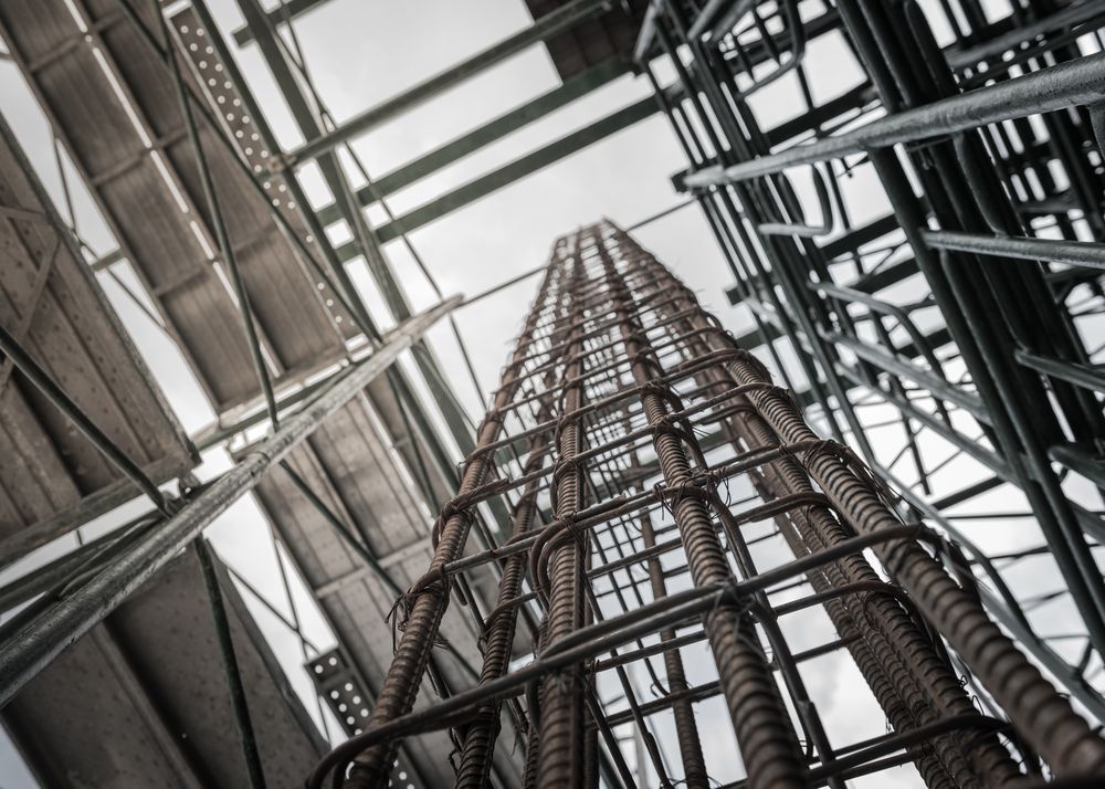 Construction Site, Looking Up at a Reinforced Steel Column, Scaffolding — NRS Scaffolding Pty Ltd in Harrington, NSW
