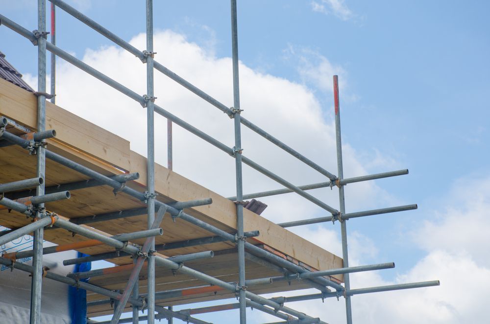 A Scaffolding Structure is Being Built on Top of a Building — NRS Scaffolding Pty Ltd in Grafton, NSW