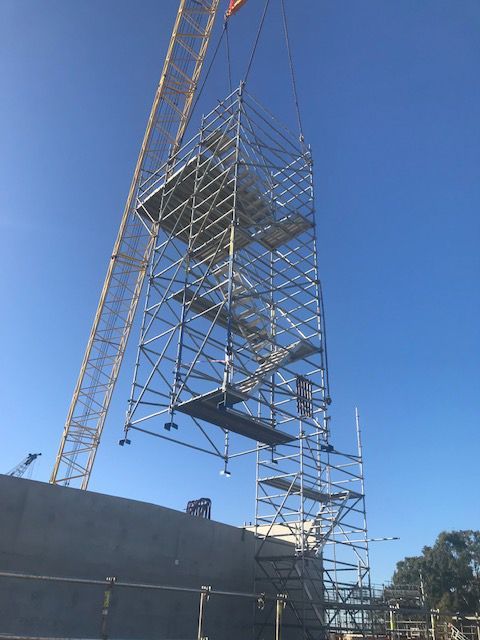 Cranes Lifting up the Scaffolding — NRS Scaffolding Pty Ltd In Clifden NSW