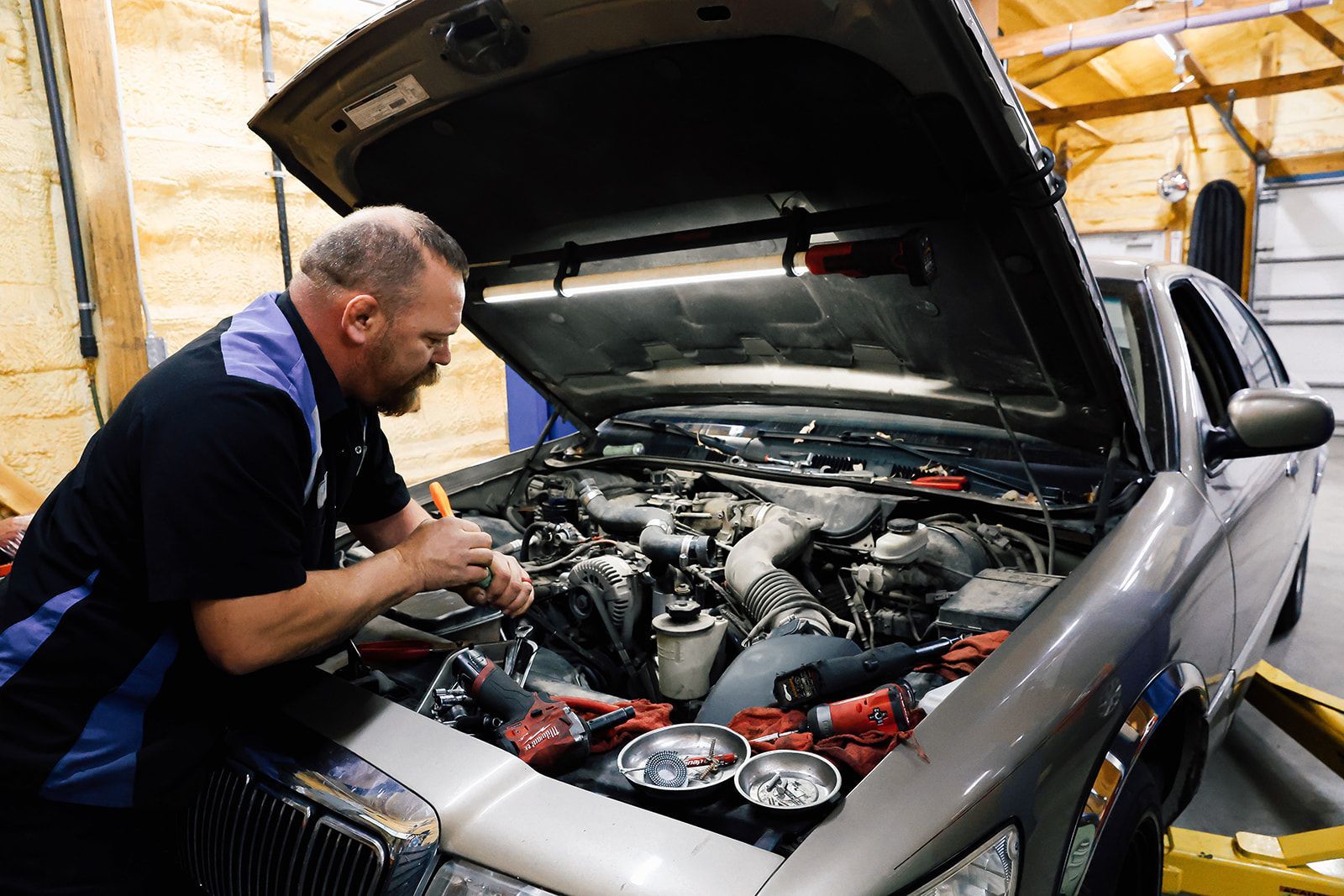 Mechanic Working on Engine | L&M Auto Repair