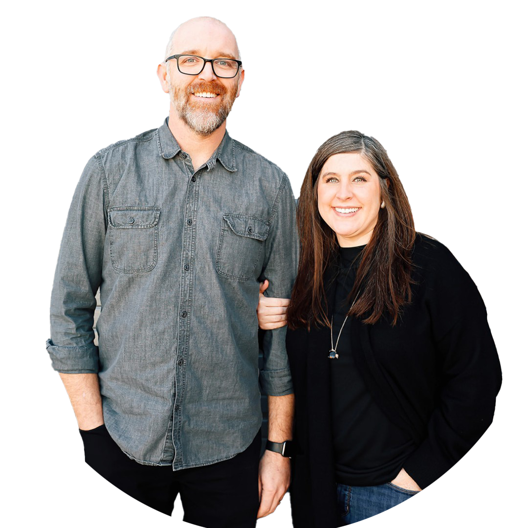A man and a woman are standing next to each other on a white background.