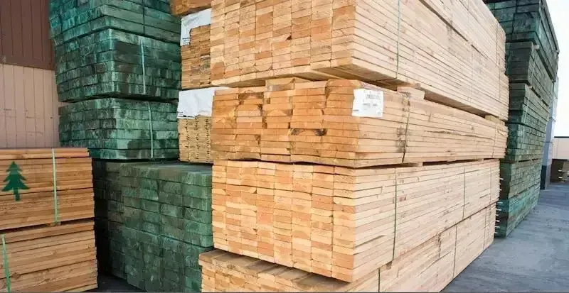 A bunch of timber is stacked on top of each other — Machin's Sawmill Pty Ltd In Wingham, NSW