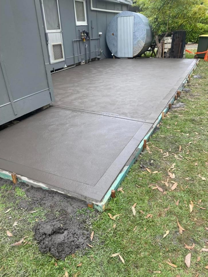 Concrete Driveway is Being Built in Front of a House — BJ's Concreting in Bomaderry, NSW