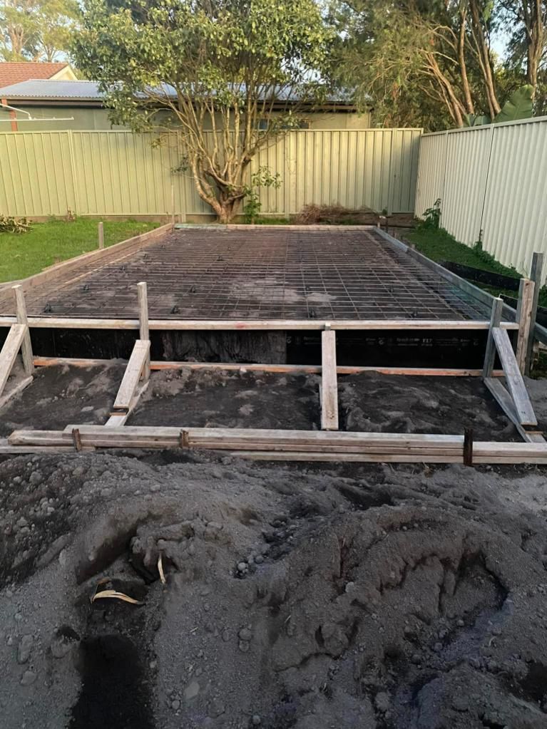 Concrete Driveway is Being Built in a Backyard — BJ's Concreting in Tomerong, NSW