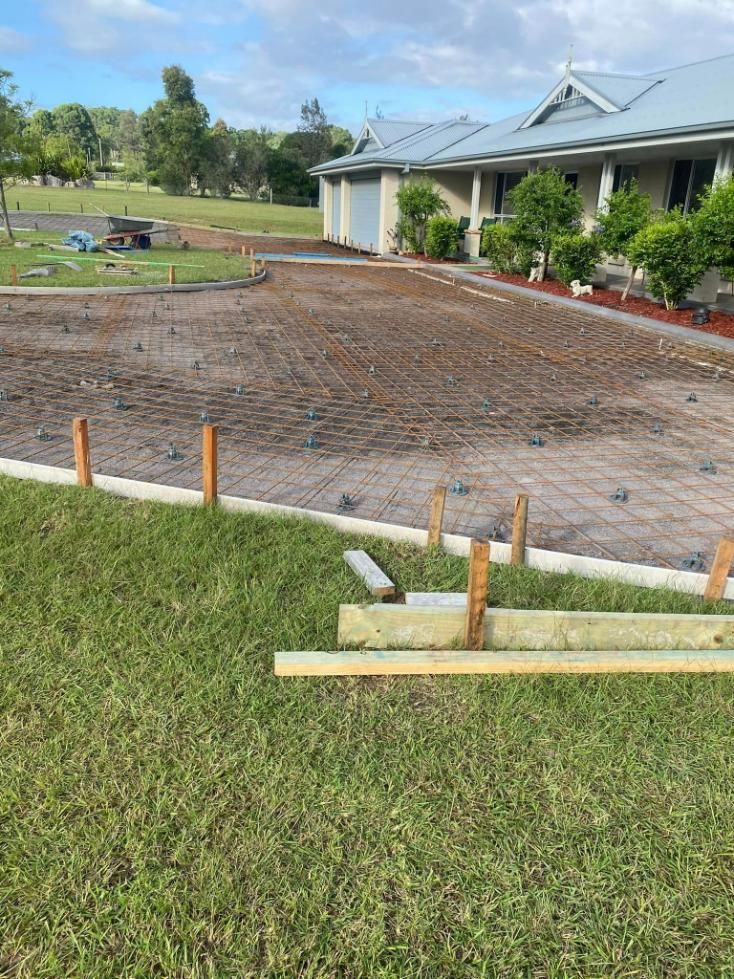 Concrete Driveway is Being Built in Front of a House — BJ's Concreting in Sanctuary Point, NSW