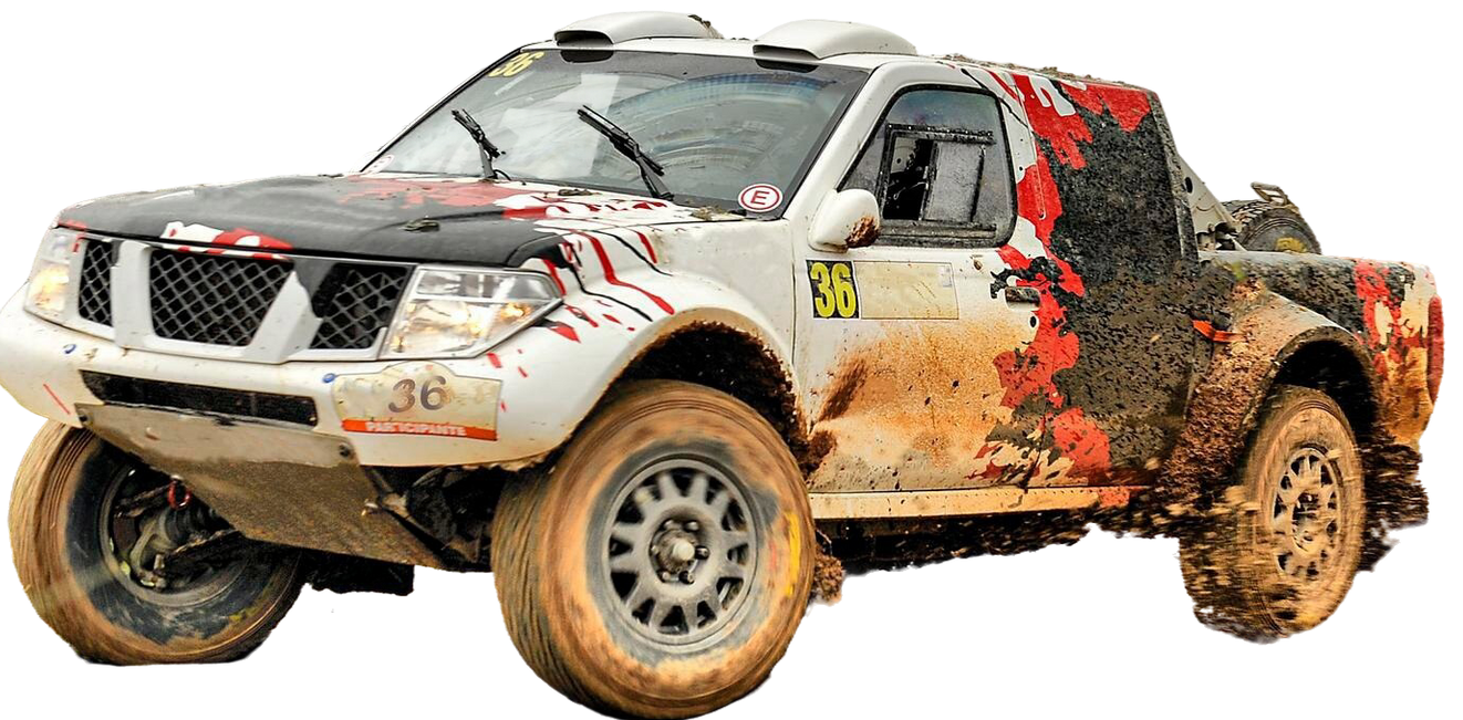 White and red off-road truck covered in mud; race vehicle.