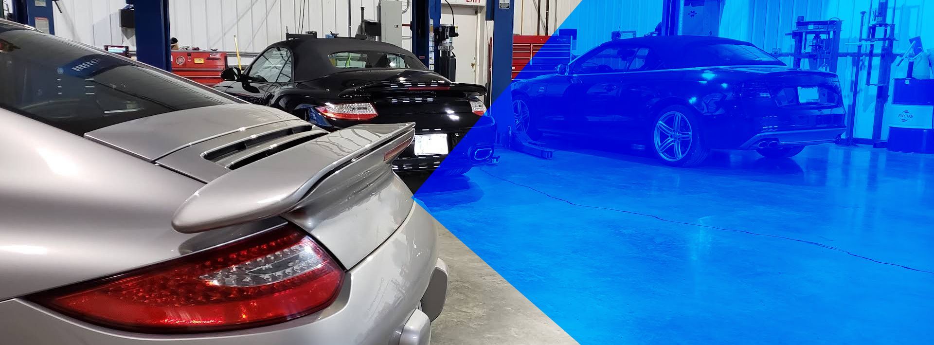 A silver Porsche in the foreground and two dark luxury convertibles in the background inside an automotive garage. | Allroad Motorsports