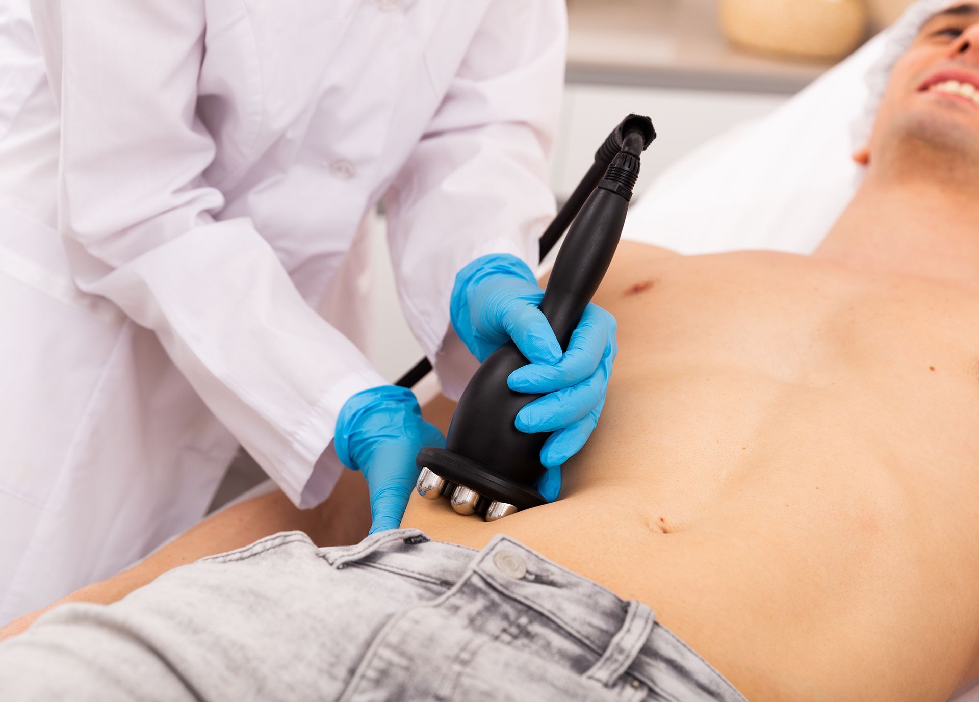 Man Getting Cavitation Treatment