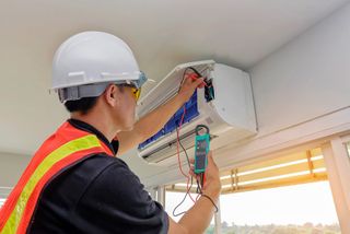 AC Repair — Repairing Air Conditioner Unit in Bristol, VA