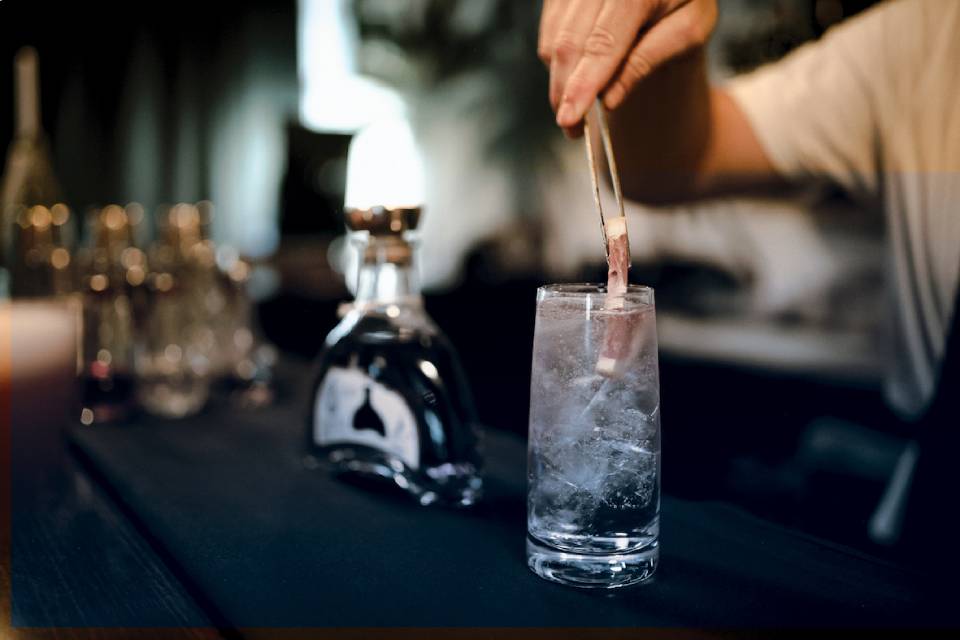 men making cocktail drink