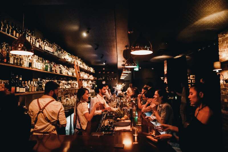 people enjoying drinks
