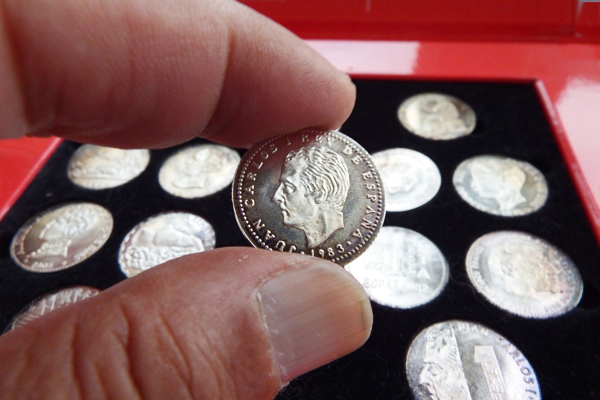 A collection of silver coins.