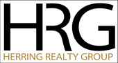 A black and white logo for herring realty group with a tree and palm trees.