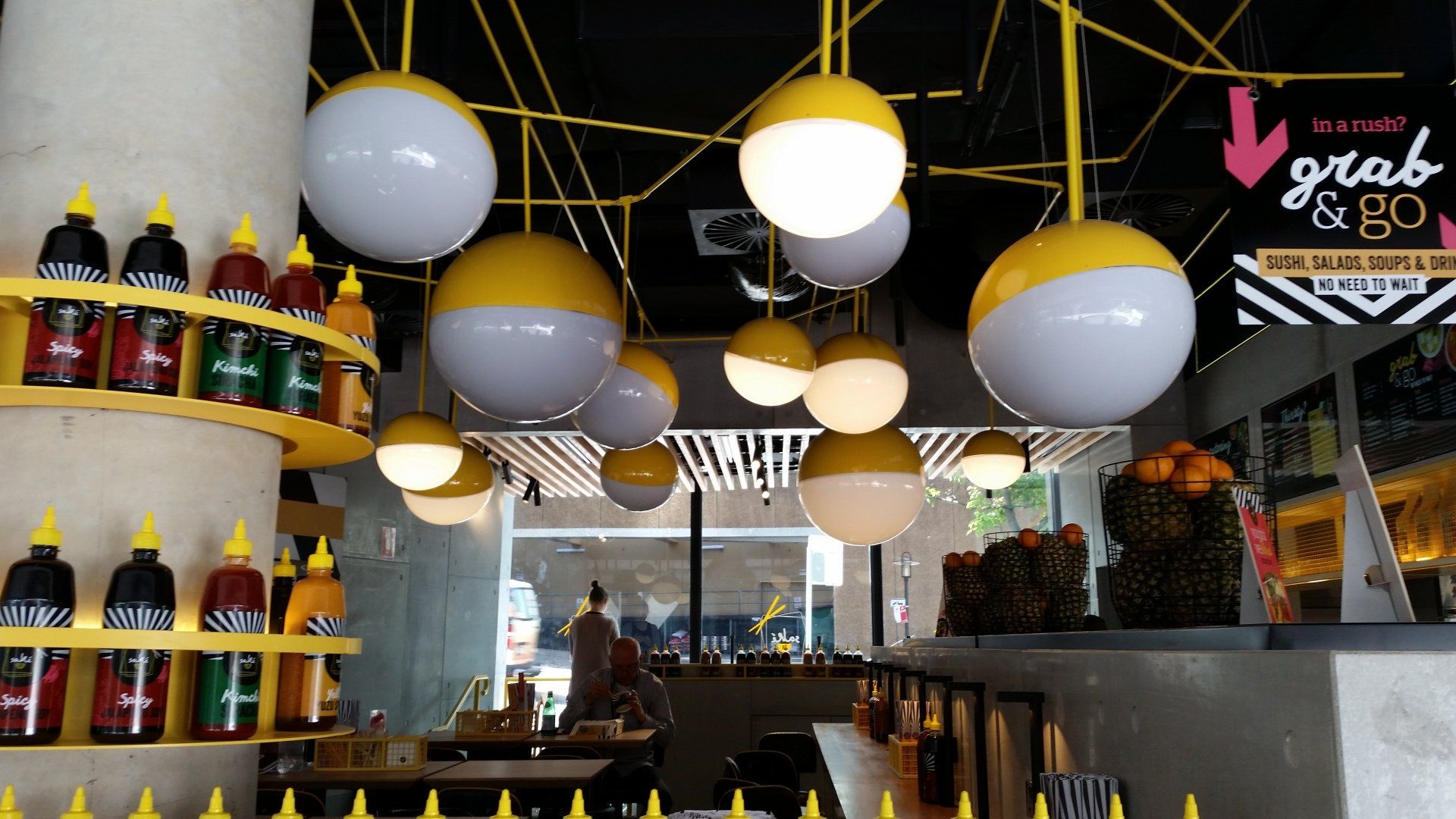 A restaurant with a sign that says grab & go