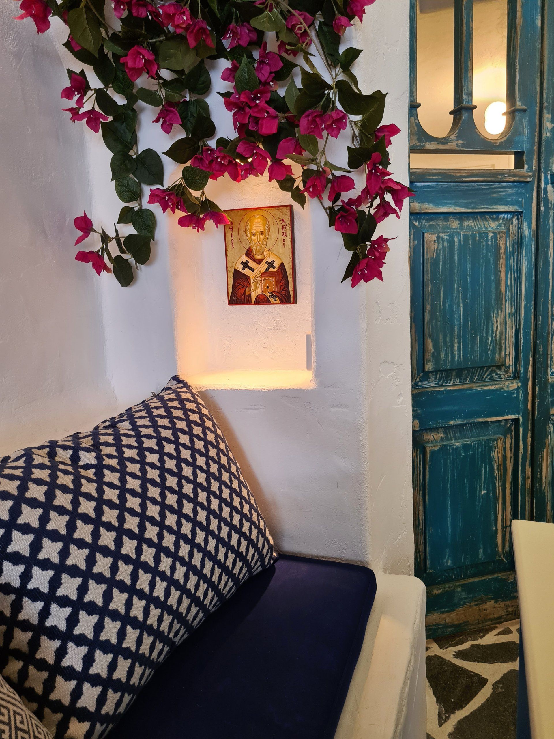 A blue door with a picture of jesus on it