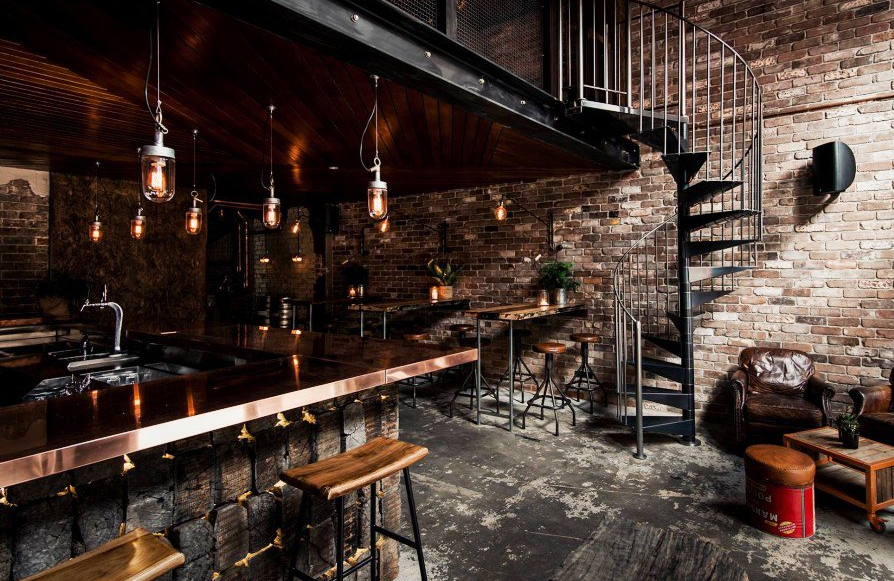 There is a spiral staircase in the middle of the room.