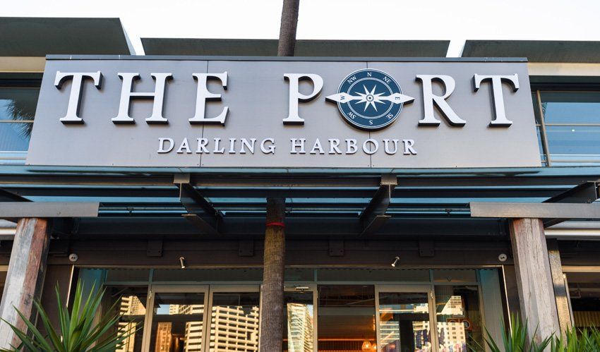 A building with a sign that says the port darling harbour