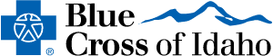 A blue cross of idaho logo with a mountain in the background