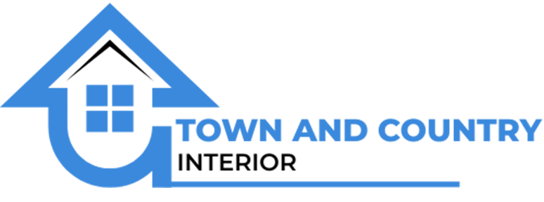 A logo for town and country interior with a house on it