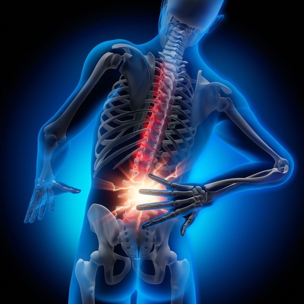 a skeleton of a person holding their back in pain
